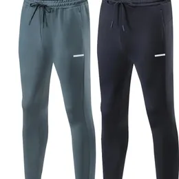 Mens Sticked Breattable Sweat Wicking Sports Straight Ben Pants är mjuka bekväma enkla vature och spårfria 240412