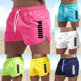 Swimwear maschile New Summer Mens Swimming Trunk 2024 Hot Sports Gym Running Shorts Beach Clothing Brand Brand Essicking Siwmwear Board Fabric Q240429