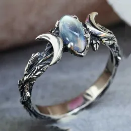 حلقات الفرقة Xizang Silver Double Moon Tension Gem Ring هندسية تصميم ضوء القمر المجوهرات الأزياء Q240429