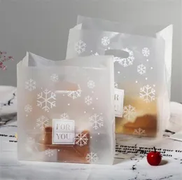 50pcslot عيد الميلاد أكياس الهدايا الأكياس البلاستيكية بووتيك البوتيك الأكياس التسوق اللوازم حقائب هدايا تعامل مع ندفة الثلج الحالية New7760520