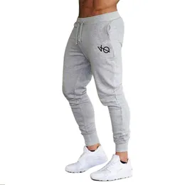 pantaloni casual sottili estivi fitness da uomo abbigliamento sportivo abbigliamento sportivo inferiore con strettousca