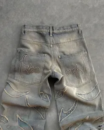 Vendita di pantaloni di jeans ricamati a bordo grezzo strappato retrò harajuku jeans baggy y2k uomini donne hip hop punk pantaloni casual 240420