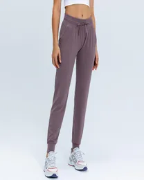 Kształtowanie L31 Women Yoga Pants Slim był cienki z kieszeniami Sport Fitness Spodnie na świeżym powietrzu Lady Lose Straight Jogger Stroje 3996582