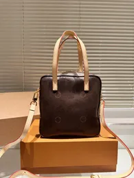24SS Herr- och kvinnors universella lyxdesigner Lunch Box Bag Women's Handbag Shoulder Bag Crossbody Bag 23cm