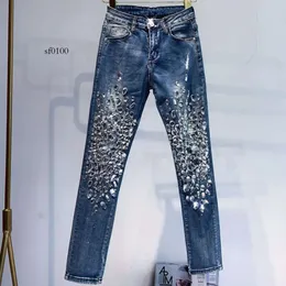 Jeans kvinnors mode vintage kvinnor lyxiga broderade flares diamant denim jeans kvinnor pärlast mager blyerts 230510