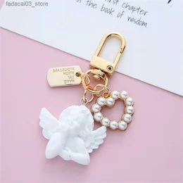 سلاسل المفاتيح Lanyards Creative Vintage White Angel Keychain Women Girl Cute Mini Pearl Heart key Chain Car Key Ring Ring Bag Bag bag charms Q240201