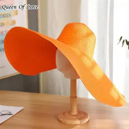 Szerokie brzegowe czapki 12 colors panie letnie ponadprzeciętne 70 cm kobiety Foppy Big Beach Hat Fashion Foolble wakacje Słońce Caps Drop296c