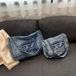 Denim dingdang küçük büyük vagrant tuval çantası, modaya uygun ve serin crossbod omuz çantası 2024 tasarım moda% 78 kapalı mağaza toptan satış