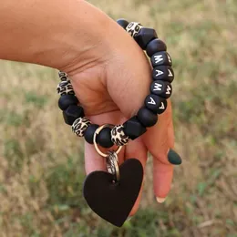 10pc anpassad 2024 Ny leopard tryckt silikon Moderpärl Keychain Armband Heart Shaped Armband Mother Charm Gift 240125