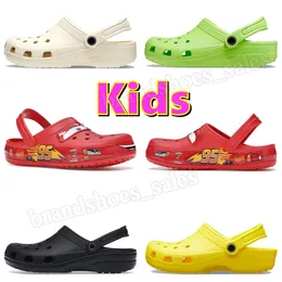 Kids Crogs Sandalet Tasarımcı Cross-Tie Classic Tulunma Kızlar Çocuklar Çocuk Toddler Slippers Slaytlar Sandal Platform Ayakkabı Cros Croos Ücretsiz Nakliye Ayakkabı Dhgate