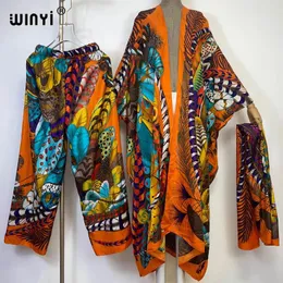 Frauen zweisteuelische Hosen Winyi 2024 zweiteiliger Anzug mit Kopfgürtel Boho Elagant Printed Kimonos Batwing-Ärmel Frauen Seidenboden Mode Mode