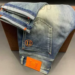 Mäns jeans designer högre version herr casual byxor byxor bokstav broderi mode knapp åtkomst män 9z73