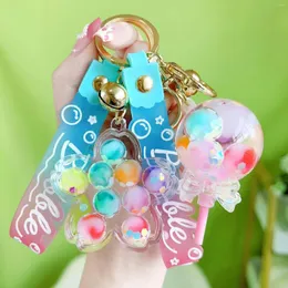 Keychains tecknad lysande bubbla pärlor flytande nyckelkedja söt kvicksand cherry blossom lollipop keyring kvinnor väska hänge nyckelfob gåvor