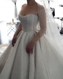 Dubai Luxury Ball Gown Wedding Dress Illusion Neck Off the Shoulder Beads Pearls Bridal Gowns Floor Length Custom Made Vestido de novia