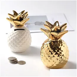 Nyhetsartiklar nordiska små ananas pengar lådor keramiska gyllene piggy bankbesparande box hem skrivbord dekoration 231225 drop de homefavor dhiye