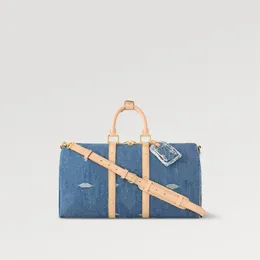 Explosion NOVO Keepall Bandoulier e 45 feminino M24315 Denim Azul Couro natural com acabamento em couro de vaca Fechamento com zíper duplo cadeado etiqueta de nome Forro jeans designer Contador