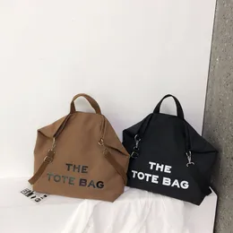 Bahar Yeni Stil Düz Renk Desteği Ekstra büyük kapasiteli tuval minimalist el omuz çantası gelgit 2024% 78 OFF Mağaza Toptan