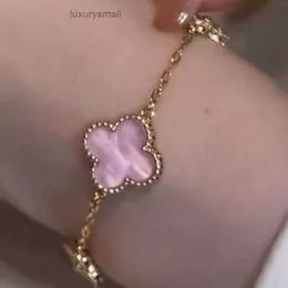 braccialetto a forma di trifoglio di vans piatto rosa braccialetto a quattro foglie di erba micro intarsiato con zircone piccolo braccialetto di erba fortunata stile di lusso da donna fresco, dolce e adorabile