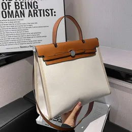 Versione coreana della piccola borsa da donna giapponese in tela a contrasto ad alta capacità, borsa a tracolla alla moda a tracolla, vendite dirette in fabbrica alla moda al 75%