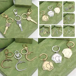 Bai Cheng KeyChain for Women Men Fashion Keyring Sier Gold Buckle Rostfritt stål Designers Keychains Högkvalitativa drivkraft Ring med Green Box2024