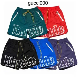 2023 nuovi pantaloncini firmati pantaloncini rhude pantaloni da spiaggia moda estiva uomo donna abbigliamento da strada di alta qualità rosso blu nero viola pantaloni da uomo corto taglia US S-2XL ZY9J