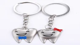 Atacado dos desenhos animados dentes chaveiro dentista decoração chaveiros modelo de dente de aço inoxidável clínica gift9520398