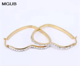 Rostfritt stål hjärtformad kristallhoppör örhängen smycken kvinnlig populära säljer billiga smycken guldfärg LH16027327669560