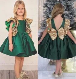 Dark Green Flower Girls -klänningar med Bow Knot -paljetter Backless Satin Girls Pageant -klänningar Knä längd ärmlös första nattvardsgång We3933764