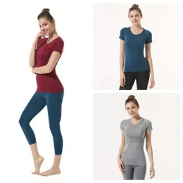 Kvinnors fitness utomhus yoga snabb torkkläder, fast färg-t-shirt, sexig snabbtorkningsdans, fitnessövning, morgonkörning, rund hals, kortärmad TS