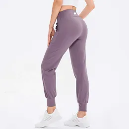 Lululelemeni Women Women Women Yoga Ninth Pants Running Fiess Joggers Soft High talia Elastyczne jogging 2024