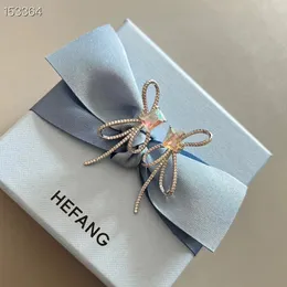 Hefang 브랜드 고급 Bow Knot Designer Earrings Stud Shining Crystal Diamond Knot Butterfly Sweet Flower CZ 지르콘은 귀 반지 귀여