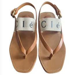 Designer tofflor Woody Sandals Tyg Canvas Letters Luxury Brand Slides Flat Sandals Bekväm trendig fashionabla öppet Ted 002