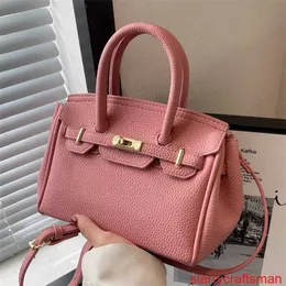 Genuine Leather Bags Trusted Luxury Handbag Baobao Womens 2024 New European and American Fashion Litchi Pattern Handheld Bag Net Red Temperament Lock with LOGO HBTL