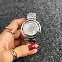Modemärke Kvinnor Girls Crystal Rotate Dial Style Metal Steel Band Quartz Wrist Watch P18248T