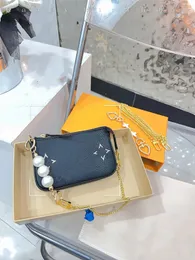 Bolsa feminina de designer de luxo Pearl Mahjong 24SS, pequena e delicada, pode conter telefones celulares, troco, batom, chaves, bolsa feminina nas axilas, doce e adorável, 15 cm