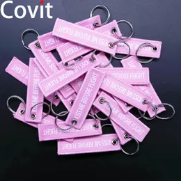 20st/Lot Storlek 7.7*2cm Keychains Aviation Gift Kiss Me Innan Flight Warning Men Pendant Duplex Woven Label Women Car Key Ring 240219