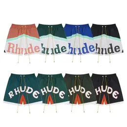 Herren-Designer-Shorts. Neu für den Sommer. Rhude-Shorts. Kontrastierende Einsätze mit Monogramm-Print. Kordelzug-Shorts. High-Street-Hosen mit lockerer Passform, schnell trocknende sportliche Freizeithosen