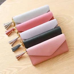 New tassel pendant womens purse Long fashion coin purse Korean edition student cute zipper card bag coin bag
