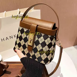 Abendtaschen Eimertasche Damen tragbar 2024 Neue Leopardenmuster Designertasche Tausend Vogel Gitter Eine Schulter Umhängetasche Koreanische Lingge Modetasche