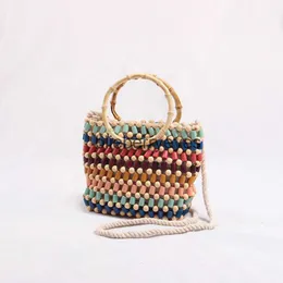 Borse da spiaggia Borsa da spiaggia 2019 colore fatto a mano con perline per bambini Borsa a tracolla portatile a spalla singola con perline intrecciate in paglia femminile H24223