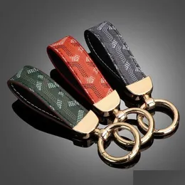 Keychains Lanyards Fashion Key Chain Buckle Lovers Car Keychain Designer Handmade Leather Design Men Women Bag Pendant Home Access Dhire