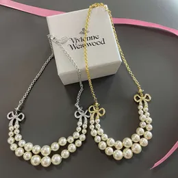 女性のための惑星ネックレスデザイナーネックレスVivienen Luxury Jewelry Viviane Westwood High Version Western Bow Double Layered Pearlネックレス