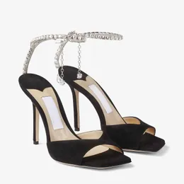 2024 Mulheres de Luxo Sandália Sapatos de Salto Alto J-C Saeda Sandália 100mm Salto Cristal Gelo Branco Partícula de Ouro Glitter Sandálias Square Toe Strass Ankle Strap com Caixa