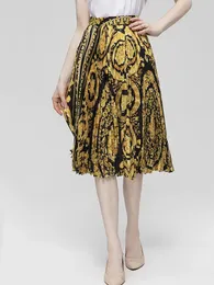 Мода по взлетно -посадочной полосе Женщины летняя юбка с высокой талией желтая цветочная принцип плиссированный винтажный ретро -элегантный миди -вечеринка праздник