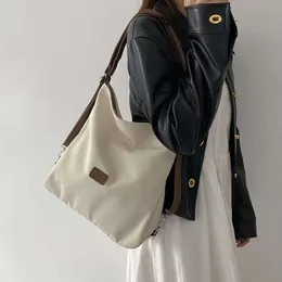 Bolsa de lona para mulheres nova mochila minimalista de alta capacidade estilo universitário elegante e versátil bolsa de ombro casual