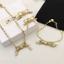 Designer miuimiui Miao 22s New Bow Tie Tassel Full of Diamond Earrings Womens Necklace Bracelet Brooch Full of Zirconium High-end and Elegant Earrings