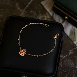 Designer Mcqeen Qeelins gioielli di lusso Nuovo bordo perlato Bracciale con zucca in calcedonio e giada rossa v Bracciale in oro con zucca intarsiata con diamanti Versione alta Bracciale in agata rossa Stagista