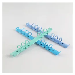 Clip per raccoglitore blu menta bianco arancione con viti color caramello