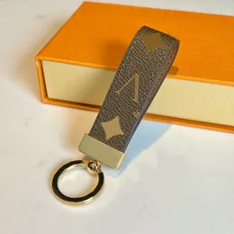 Fashion Keychains Designer Lanyard Black Dragonne Lederschlüssel Ring für Frauen Herren Exquisite Portachiavi Brieftaschenbriefe Lederschlüsselkette für Männer PJ047 E4