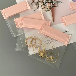 Schmuck 100 Stück rosa Reißverschluss matt gefrostet Schmuck Aufbewahrungstasche hochwertige klare Druckverschlusstasche Ringe Ohrringe Halskette Verpackung